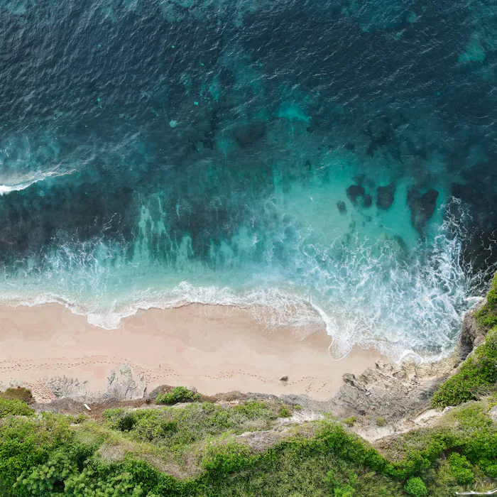 Sandy beach and surf from the air