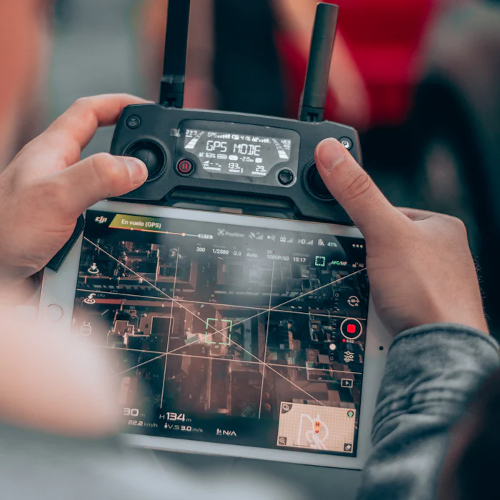 Pilot operating a drone controller