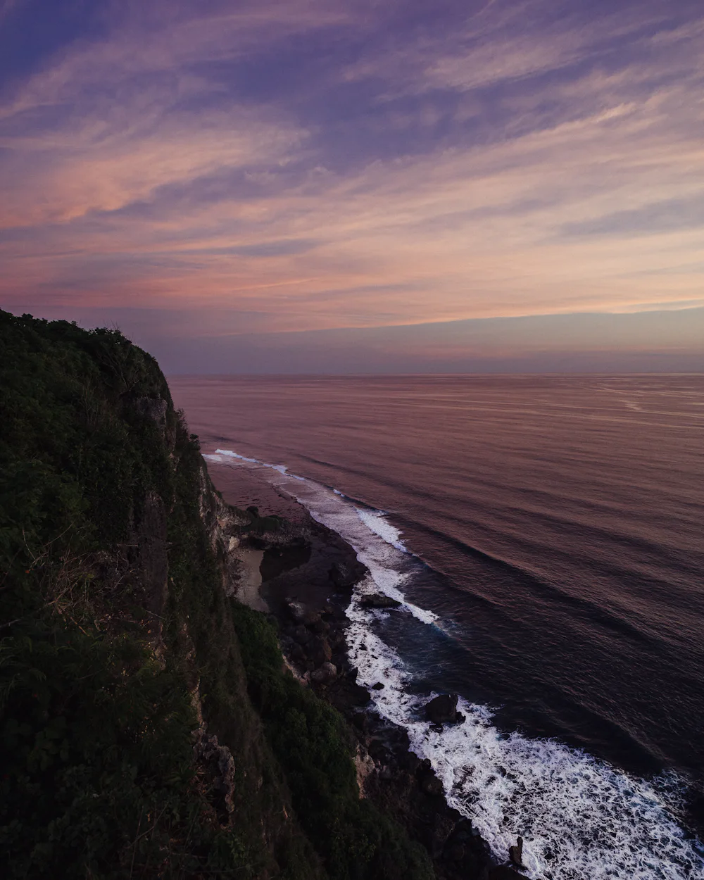 Bali coastline and headland at sunset from the air